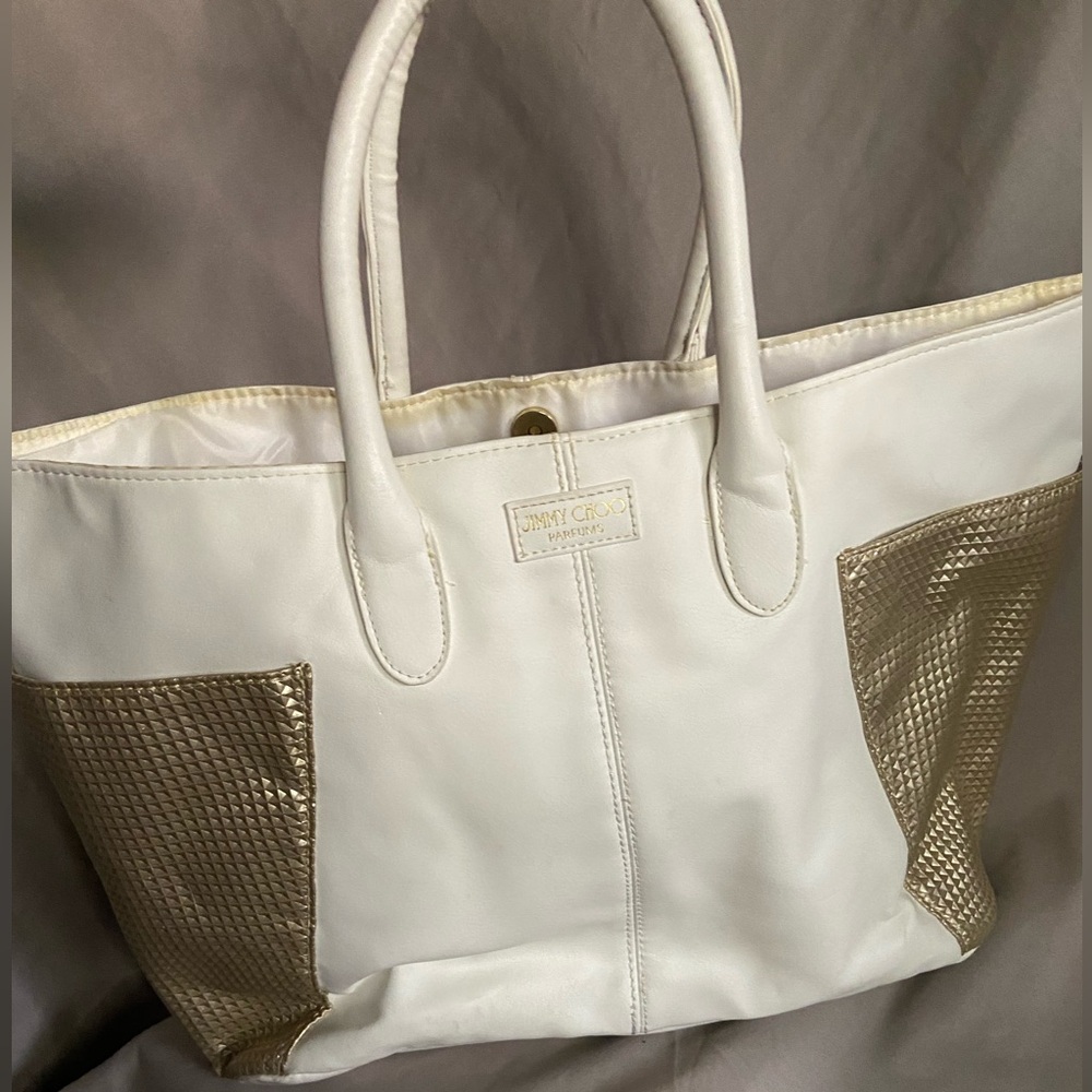 Jimmy Choo tote bag

Super cool, vintage two-toned tote bag